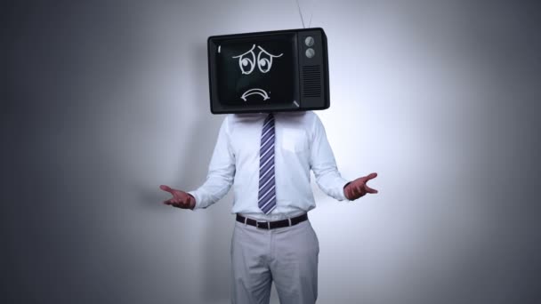 Businessman with tv on his head — Stock Video