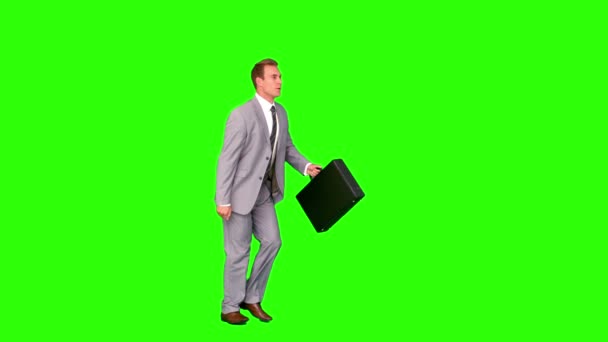 Geschäftsmann läuft auf grünem Bildschirm — Stockvideo