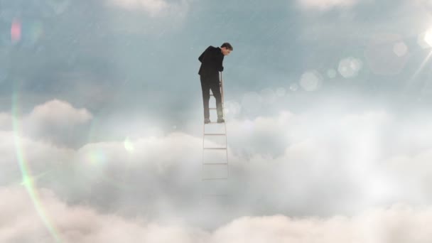 Businessman on ladder looking down — Stock Video