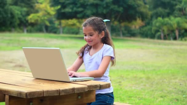 Girl using laptop computer — Stock Video