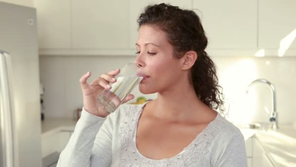 Pregnant woman drinking water — Stock Video