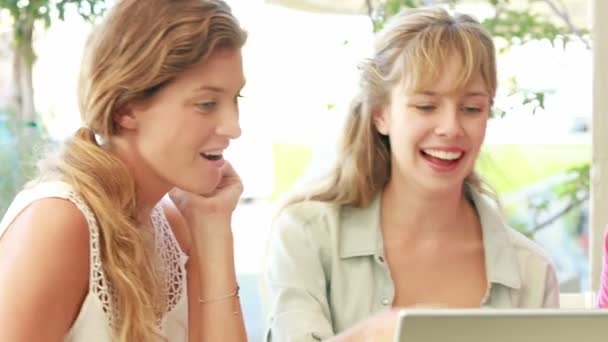 Friends looking at laptop computer — Stock Video