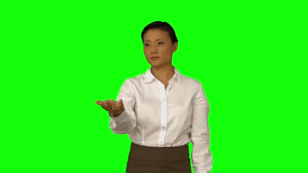 Businesswoman presenting with her hand — Stock Video