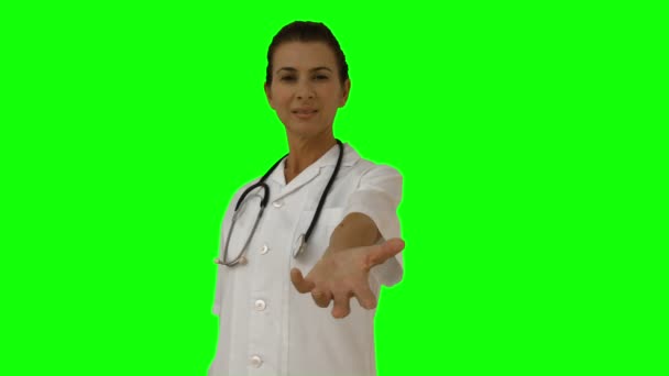 Doctor presentando con su mano — Vídeos de Stock