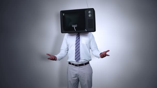 Businessman with tv on his head — Stock Video