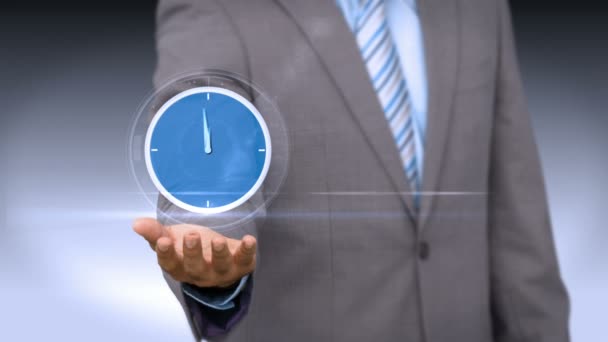 Businessman holding virtual clock — Stock Video