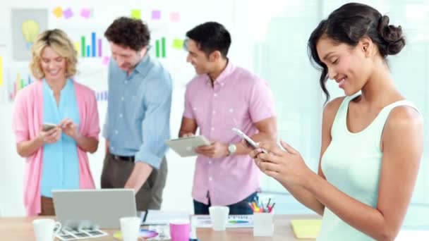 Smiling businesswoman using a tablet — Stock Video