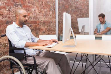 businessman in wheelchair working clipart