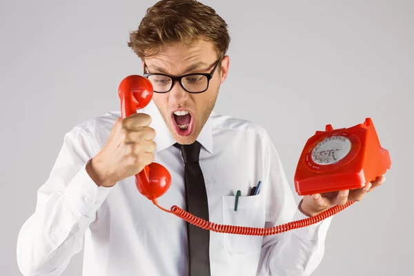 Businessman holding telephone — Stock Photo, Image