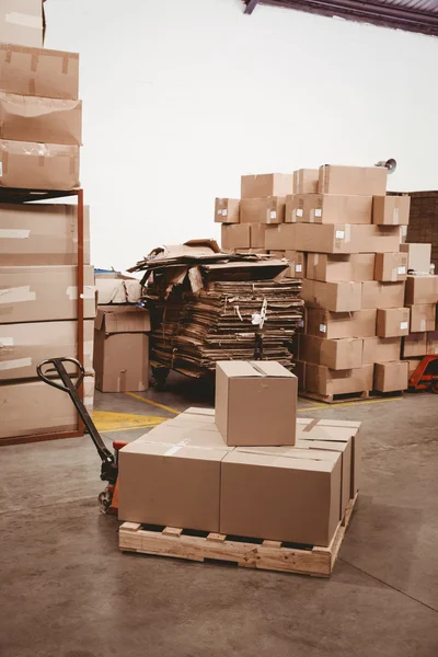 Cardboard boxes in warehouse — Stock Photo, Image