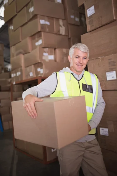 Worker carrying box — Stock Photo, Image