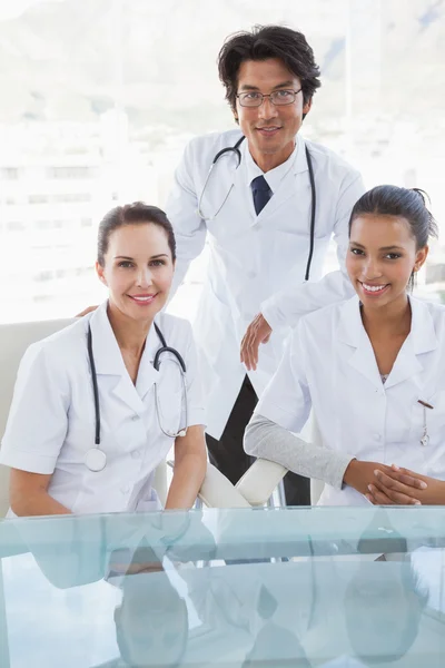 Doctors looking at camera — Stock Photo, Image