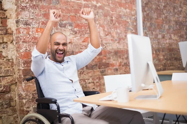 Businessman in wheelchair cheering — Stock Photo, Image
