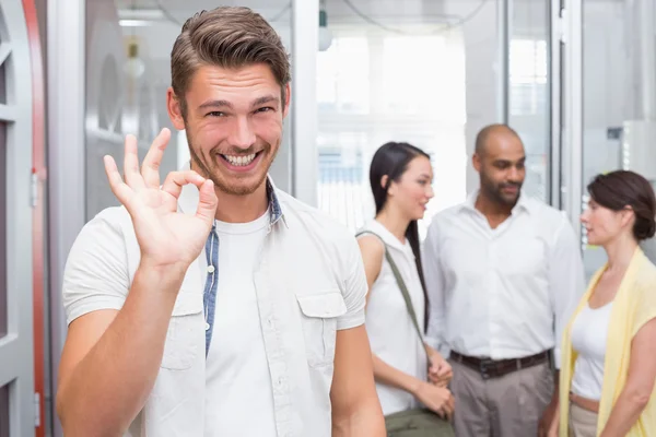 Businessman making okay gesture — Stock Photo, Image