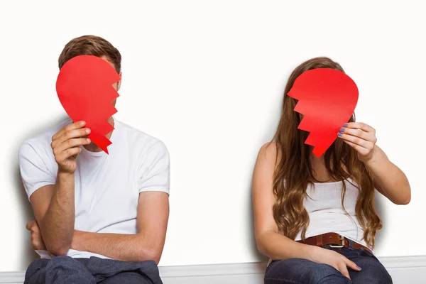 Couple holding broken heart — Stock Photo, Image