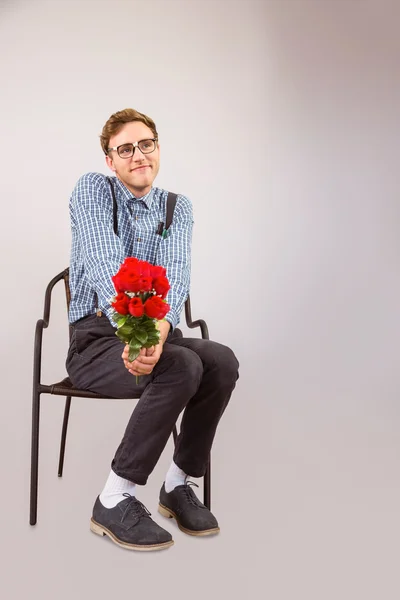 Hipster holding bunch of roses — Stock Photo, Image