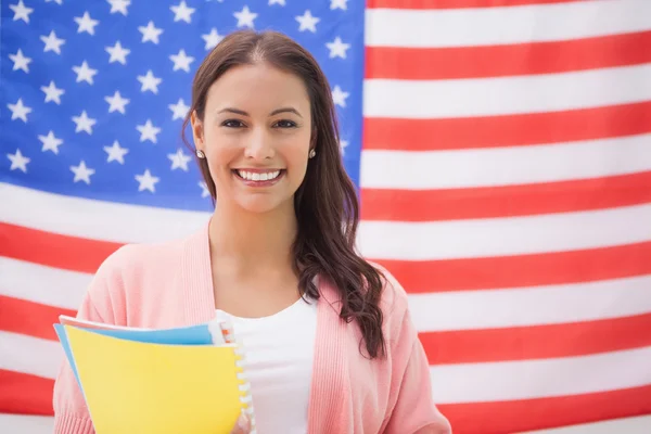 Estudiante sosteniendo cuadernos — Foto de Stock