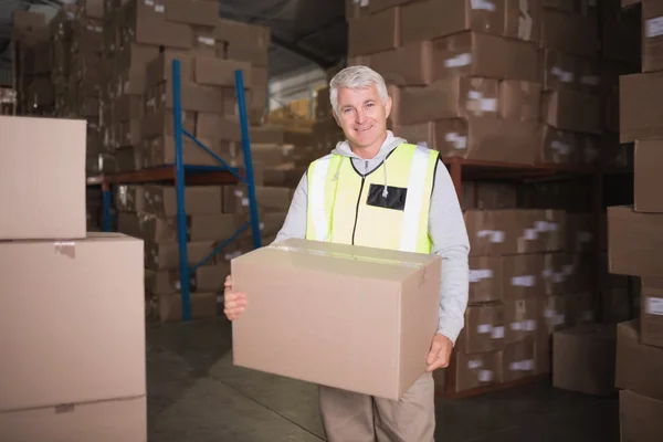 Worker carrying box — Stock Photo, Image