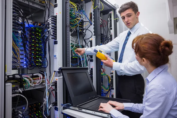 Technicians using digital cable analyser — Stock Photo, Image