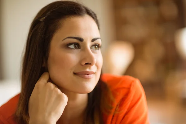 Woman relaxing on couch — Stock Photo, Image