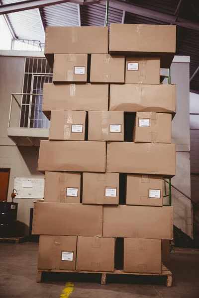 Cardboard boxes in warehouse — Stock Photo, Image