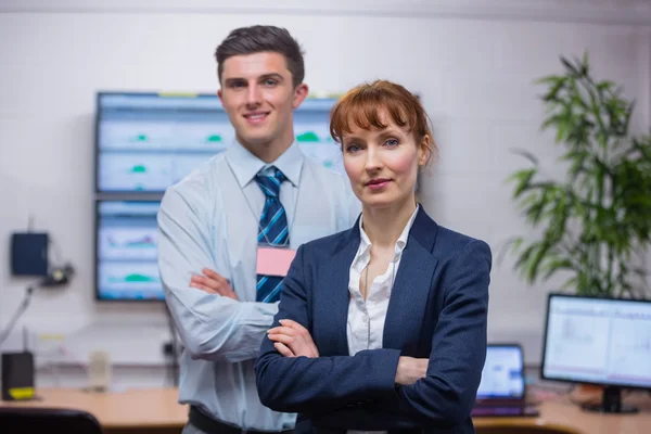 Technicians standing with arms folded — Stock Photo, Image