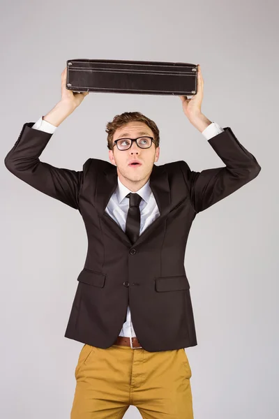 Businessman holding briefcase Royalty Free Stock Photos