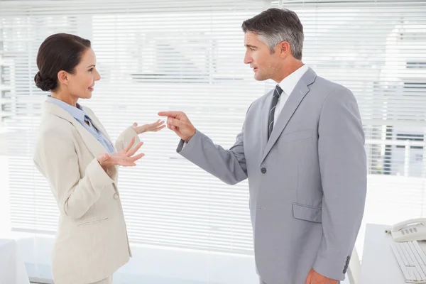 Businessman scolding coworker Royalty Free Stock Photos