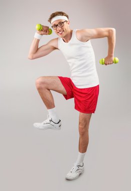 hipster in sportswear with dumbbells clipart