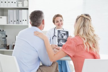 couple talking to doctor clipart