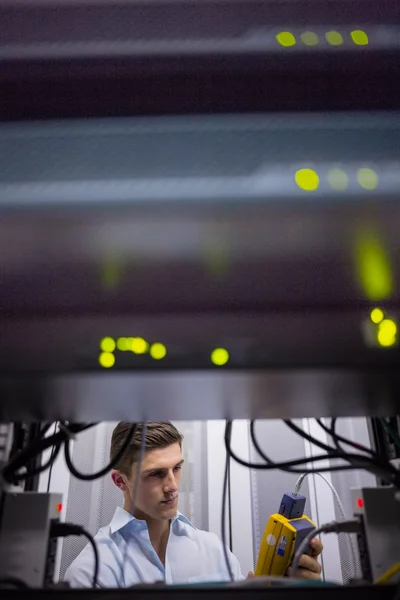 Technician using digital cable analyzer — Stock Photo, Image