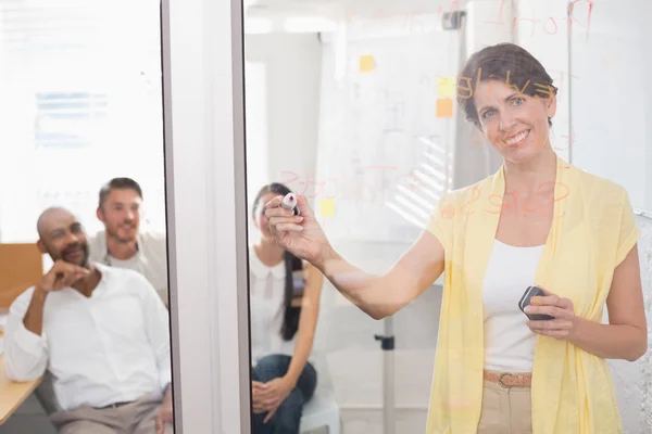 Businesswoman writing brainstorming ideas — Stock Photo, Image