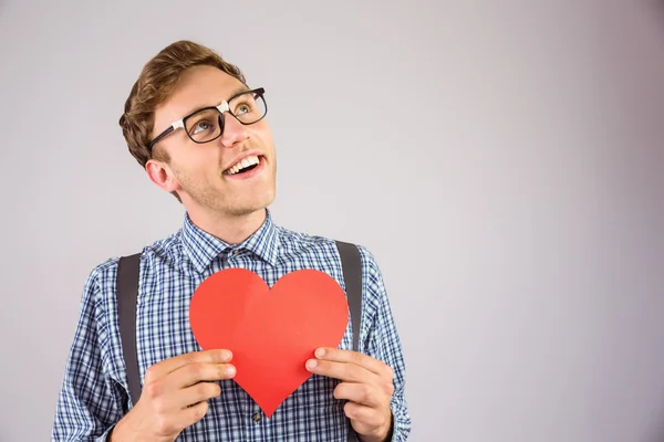 Hipster holding heart card — Stock Photo, Image