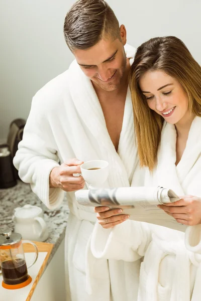 Cute couple in bathrobes — Stock Photo, Image