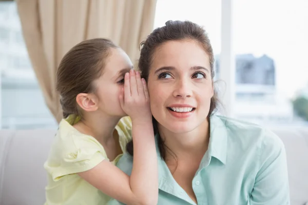 Mother and daughter on couch — Stock Photo, Image