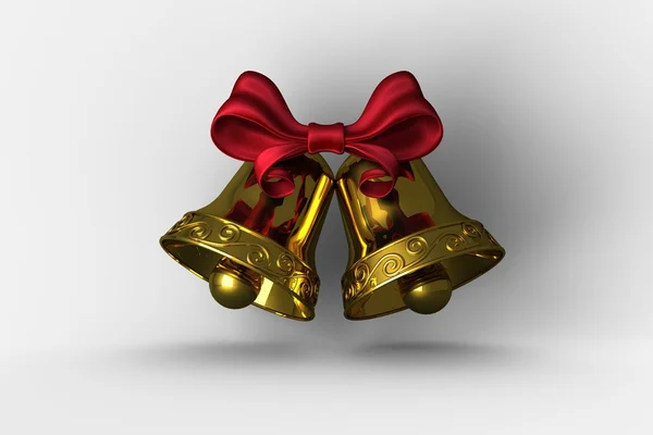 Golden bells with red ribbon — Stock Photo, Image