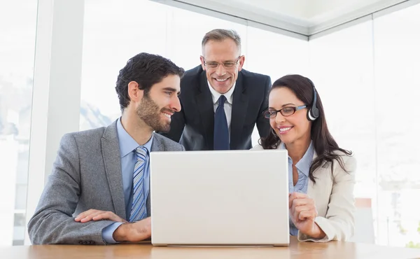 Coworkers all partaking in call — Stock Photo, Image