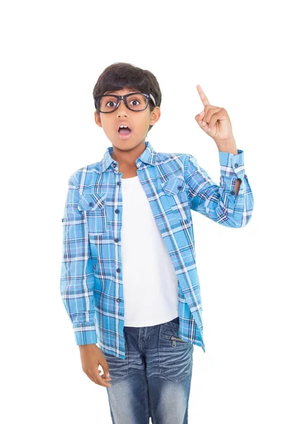 Boy pointing up with finger — Stock Photo, Image