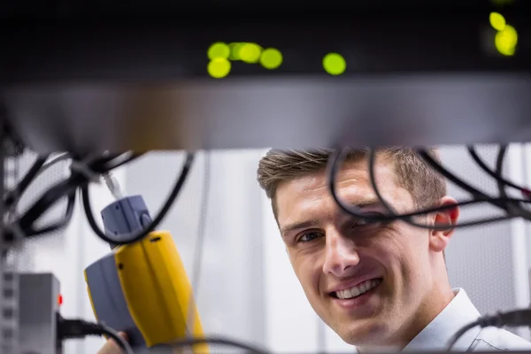 Technician using digital cable analyzer — Stock Photo, Image