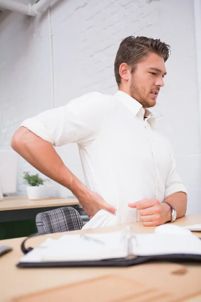 Businessman suffering from backache — Stock Photo, Image