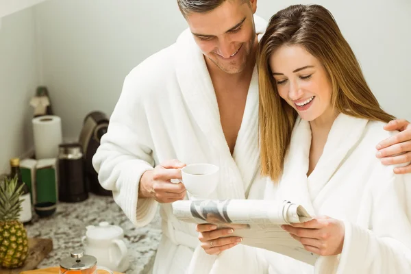 Cute couple in bathrobes — Stock Photo, Image