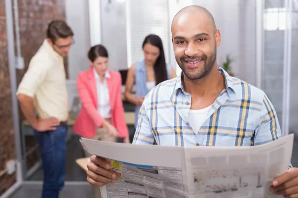 Businessman reading newspaper — Stock Photo, Image