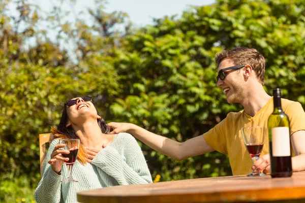 Couple enjoying red wine — Stock Photo, Image
