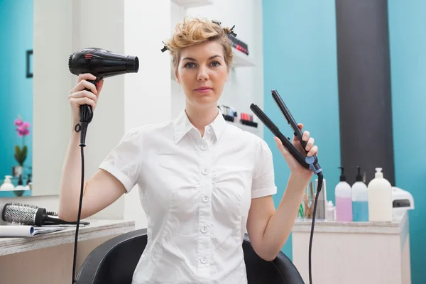 Müşteri tutma saç kurutma makinesi — Stok fotoğraf