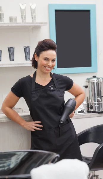 Hairdresser holding hair equipment — Stock Photo, Image