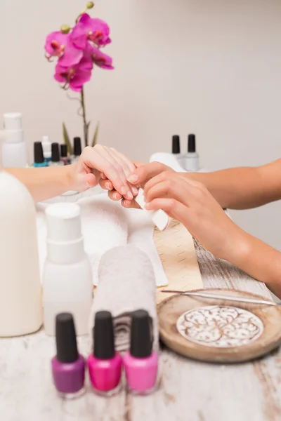 Nail technician giving custome manicure — Stock Photo, Image