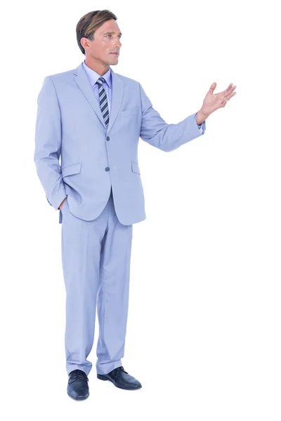 Handsome businessman gesturing with hands — Stock Photo, Image