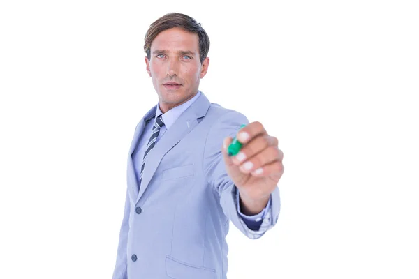 Businessman writing with black marker — Stock Photo, Image