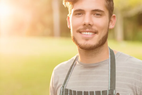 Handsome farmer smiling at camera — Stock Photo, Image