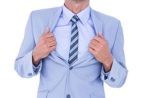 Empresario sosteniendo su chaqueta — Foto de Stock